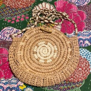 Inc straw/ rattan circle crossbody bag with toggle closure. EUC
